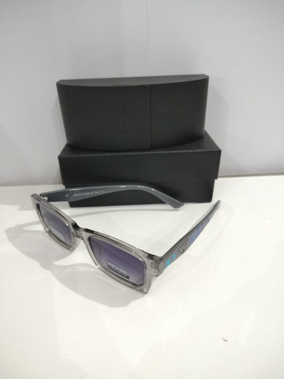 Prada Transparent Frame Sunglasses with Gradient Lenses