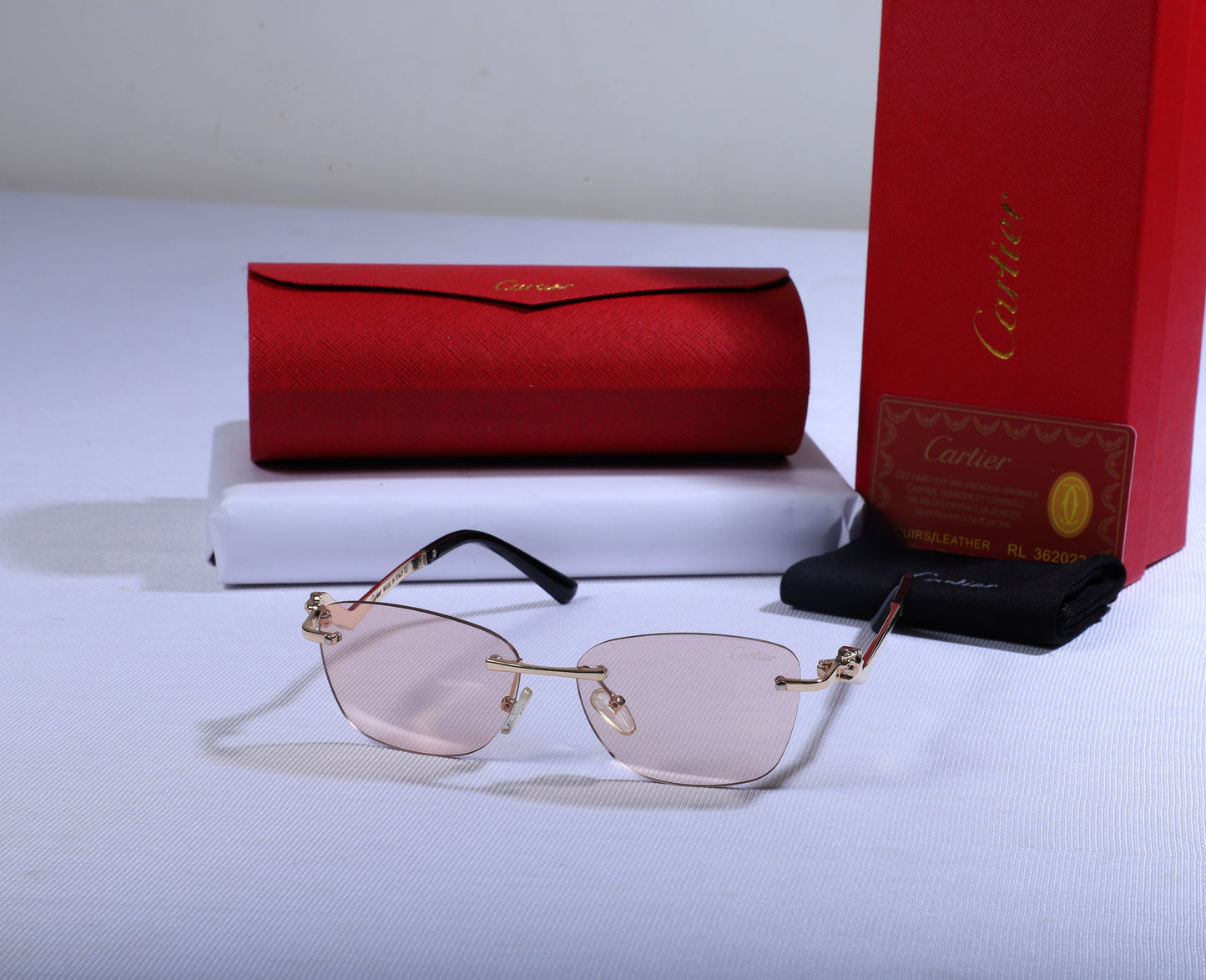 Cartier Elegant Pink Lens Sunglasses with Signature Case