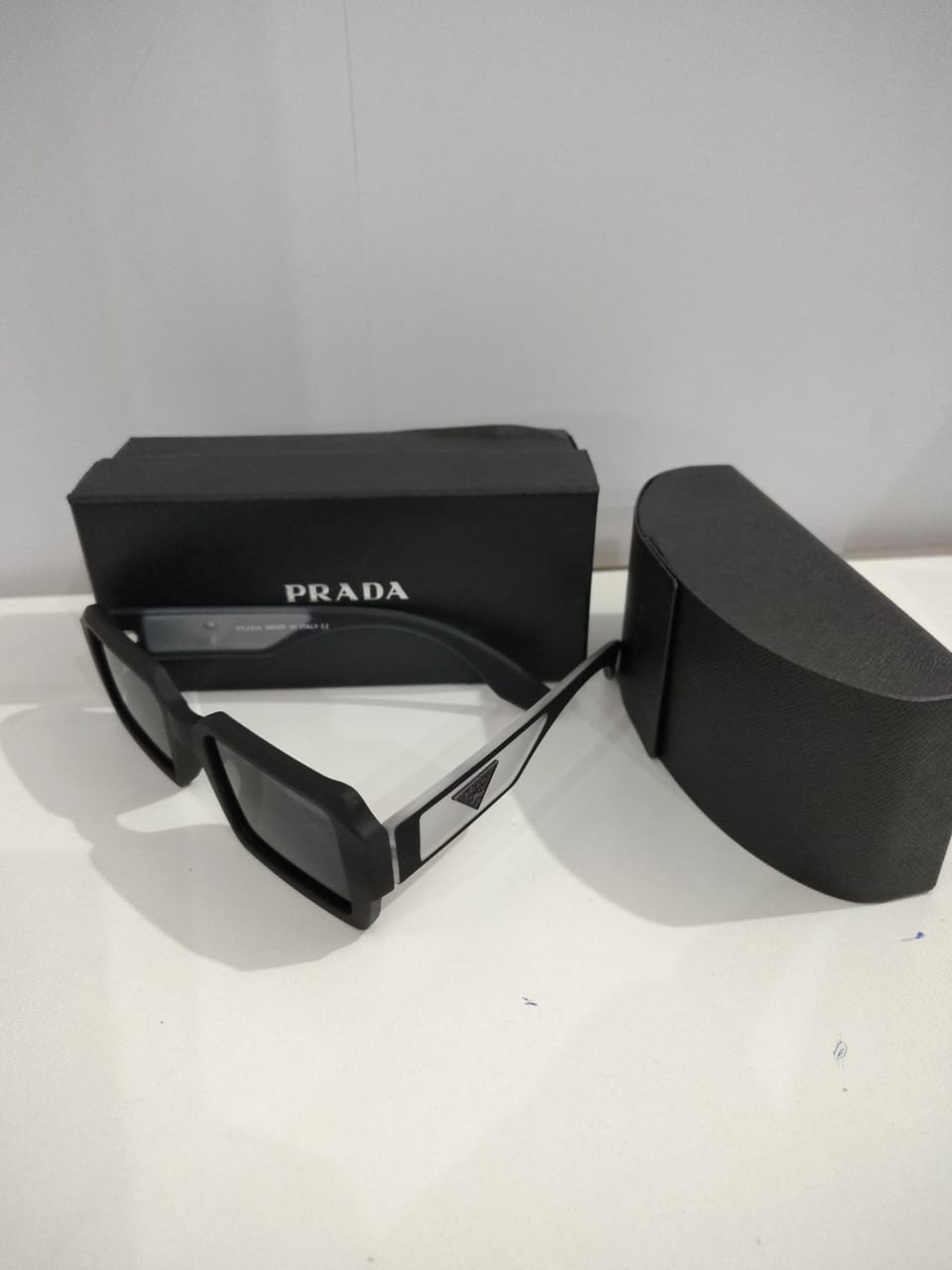 PRADA Sleek Black Square Sunglasses with Case