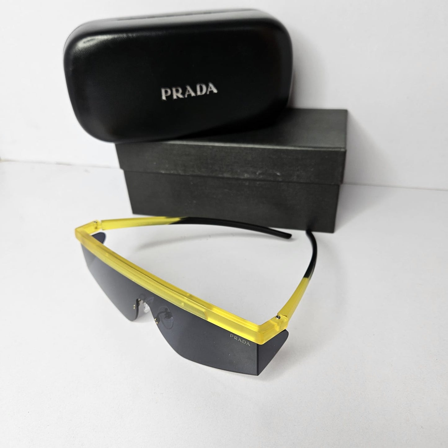 PRADA Luminous Amber Bold Shield Sunglasses