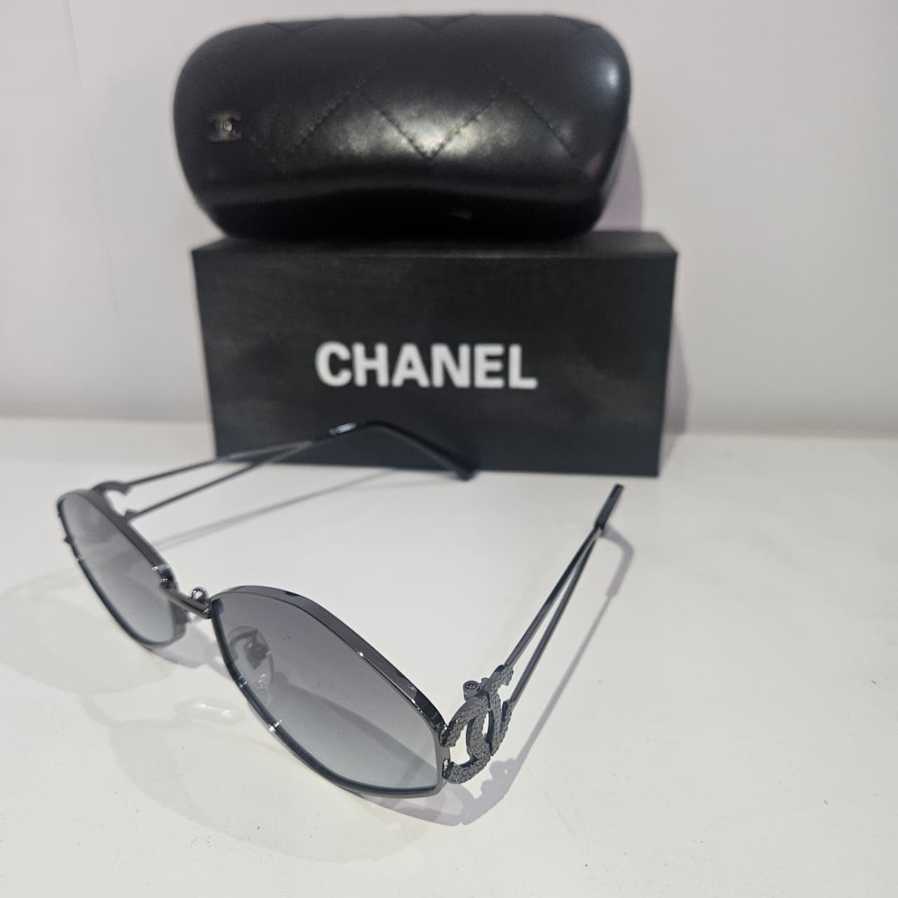 CHANEL Elegant Oval Sunglasses with Quilted Case
