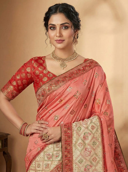 Elegant Weaves Coral Silk Saree with Intricate Gold Embroidery