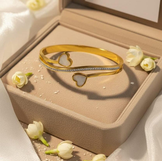 Elegant Touch Heart-Shaped Gold Bangle with Crystal Accents
