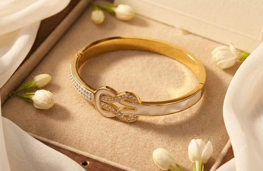 Elegant Adornments Golden Knot Bangle with Crystal Accents
