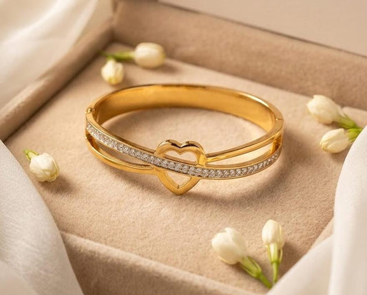 ELEGANT TOUCH Radiant Amber Heart Embrace Bangle with Crystal Embellishments