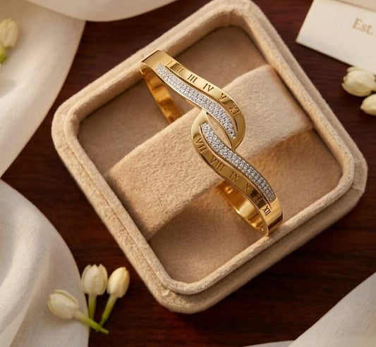 ELEGANT TIMEPIECES Luminous Amber Twisted Gold and Diamond Bracelet