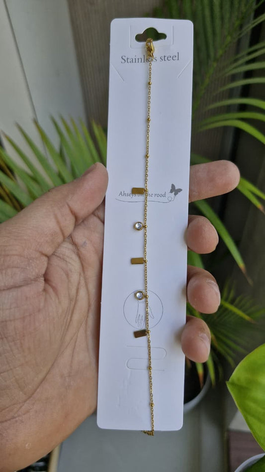 ALHAYA Radiant Amber Luxe Stainless Steel Bracelet with Pearl Accents