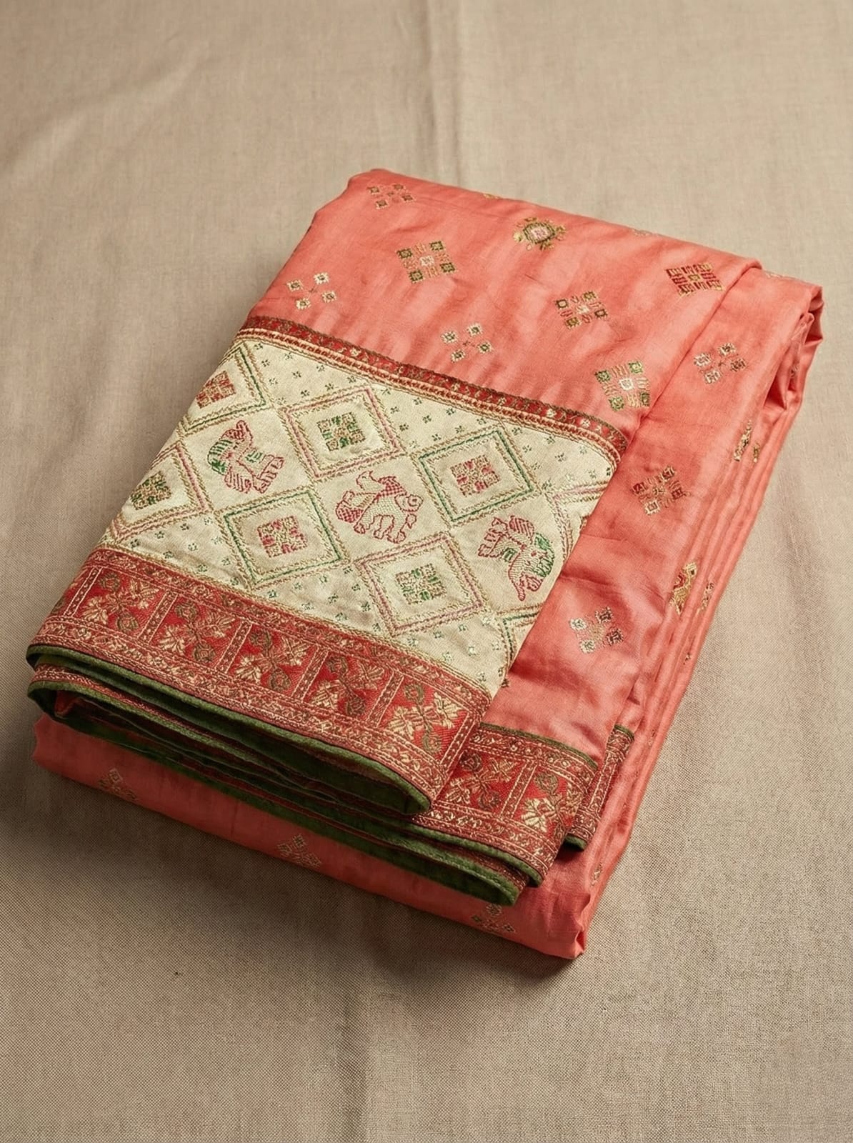 Elegant Weaves Coral Silk Saree with Intricate Gold Embroidery